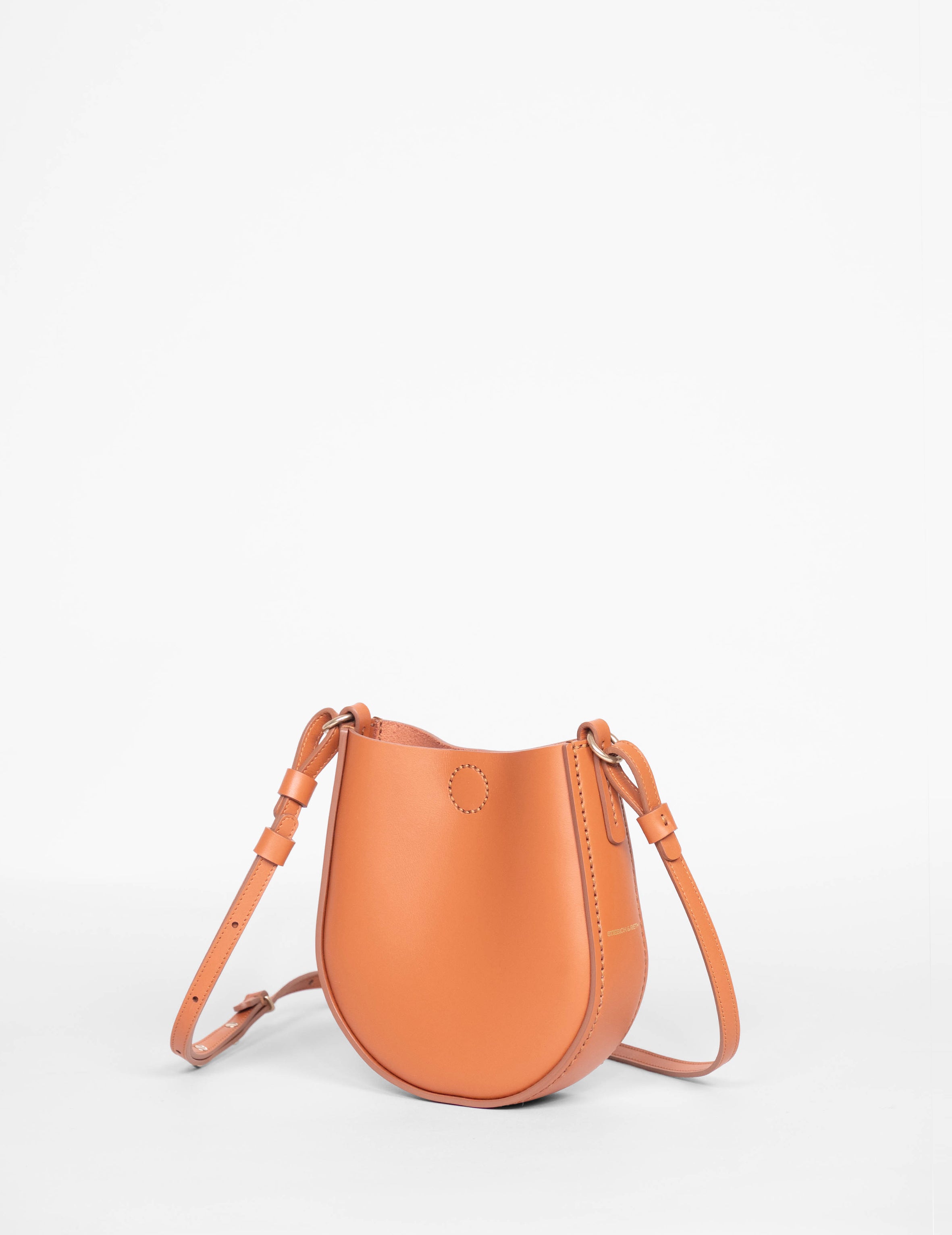 BABY LOOP kleine Umhängetasche, pumpkin Seitenansicht, Messingdetails