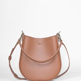 LOOP Schultertasche aus rbraunem Rindsleder mit halbrundem Korpus, Kurzhenkel und verstellbarem Schulterriemen, handgenäht